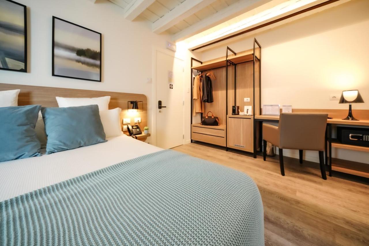 Bergamo Inn 15 Экстерьер фото A room at the hotel